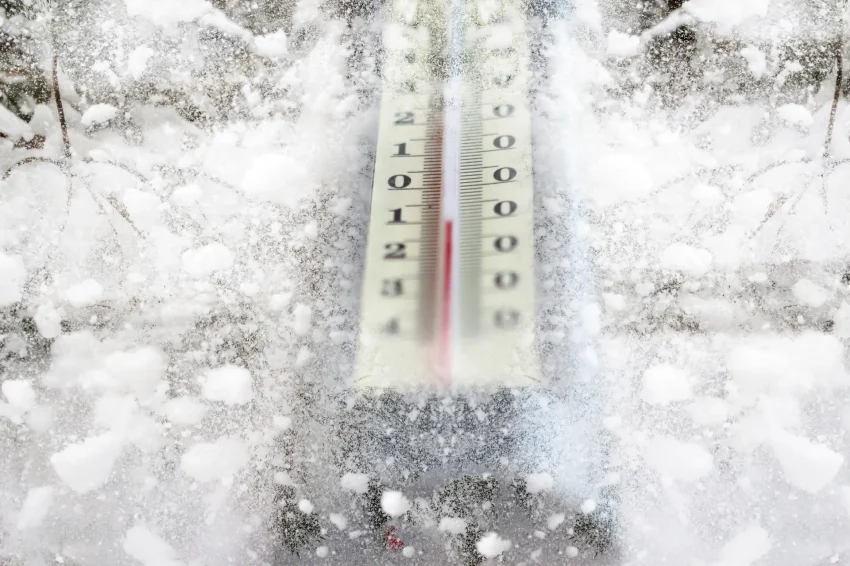 winter thermometer. Winter time. Thermometer on snow shows low temperatures in celsius. Frost, therm